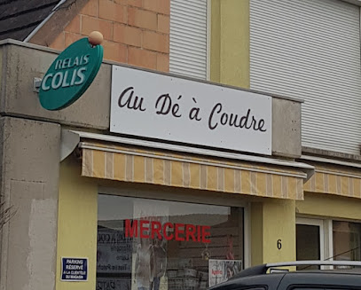 Photo Au Dé à Coudre